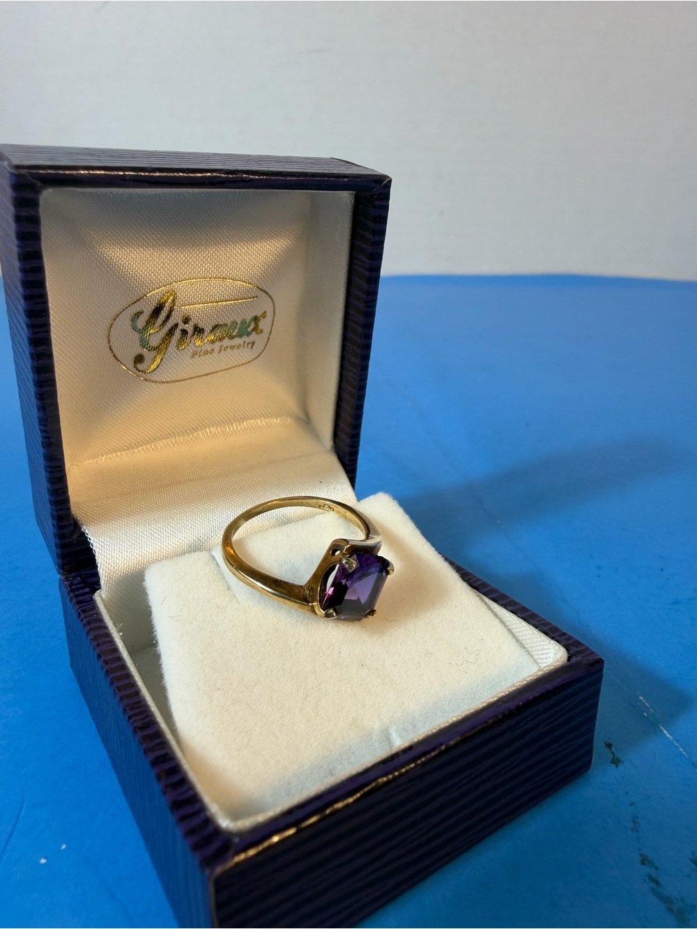 Gold Ring with Purple Gemstone